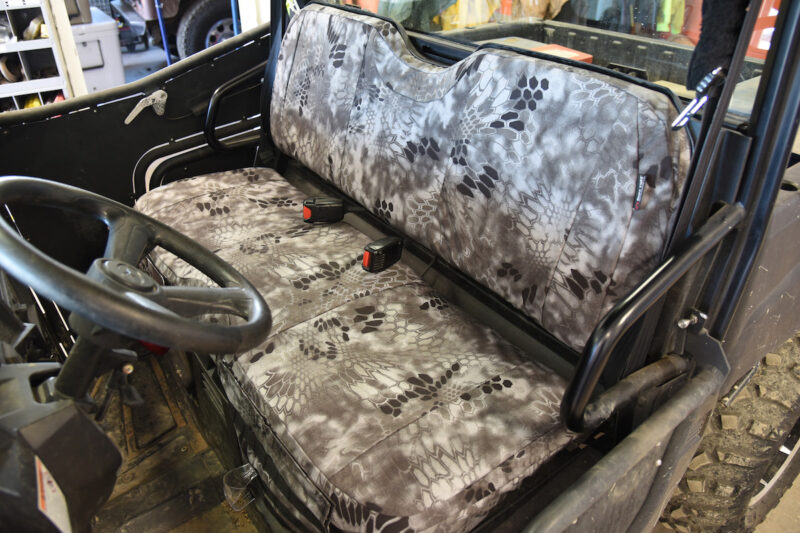 2015 Polaris Ranger front bench seat covered in Kryptek Raid camouflage canvas