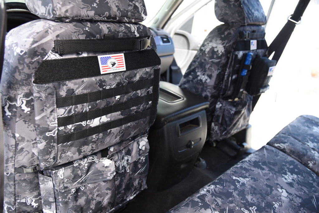 2009 GMC Sierra 2500 TrueTimber Urban seat covers with MOLLE panel and rear storage pouch