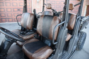 2021 Can-Am Defender UTV exotic seat covers with Midnight Croc inserts and Java Croc trim on front and rear seats