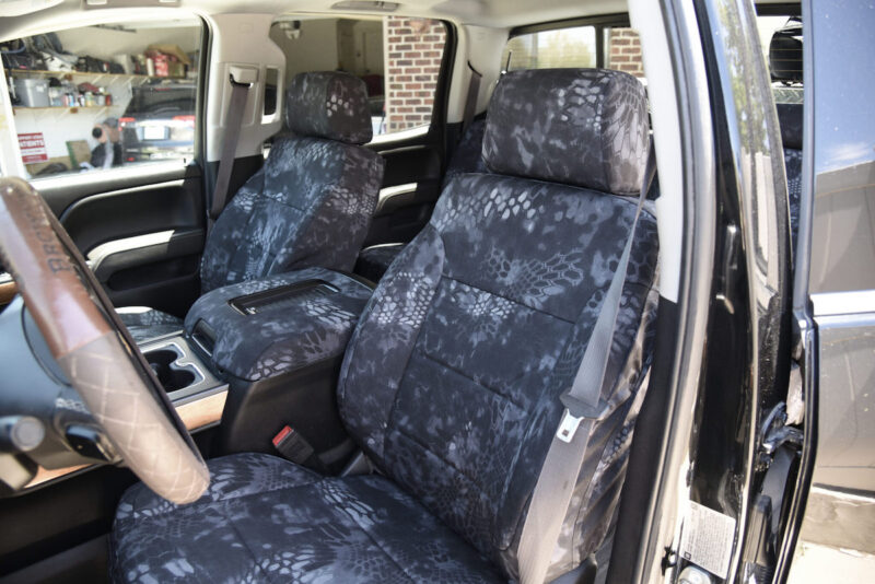 2017 Chevy Silverado 2500 front Kryptek Typhon seat covers with matching center console cover