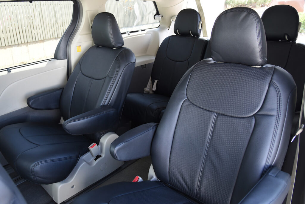 2012 Toyota Sienna front Genuine Leather seat covers with Black Perforated Leather inserts with Black Vinyl trim and Black Stitch