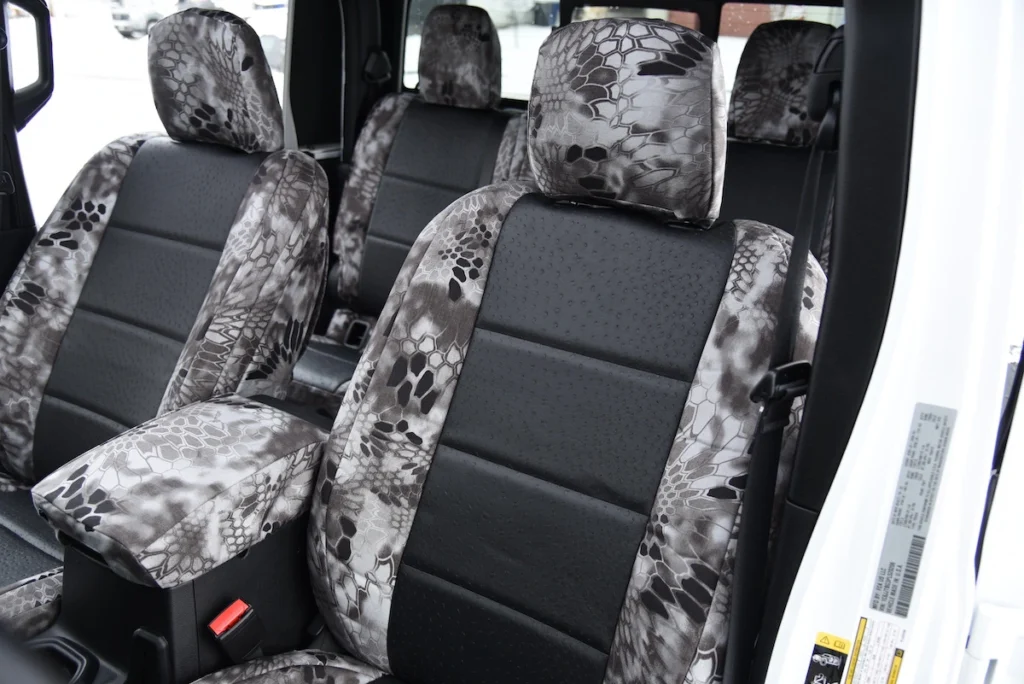 2023 Jeep Gladiator front Kryptek seat covers with Black Ostrich inserts and Kryptek Raid trim
