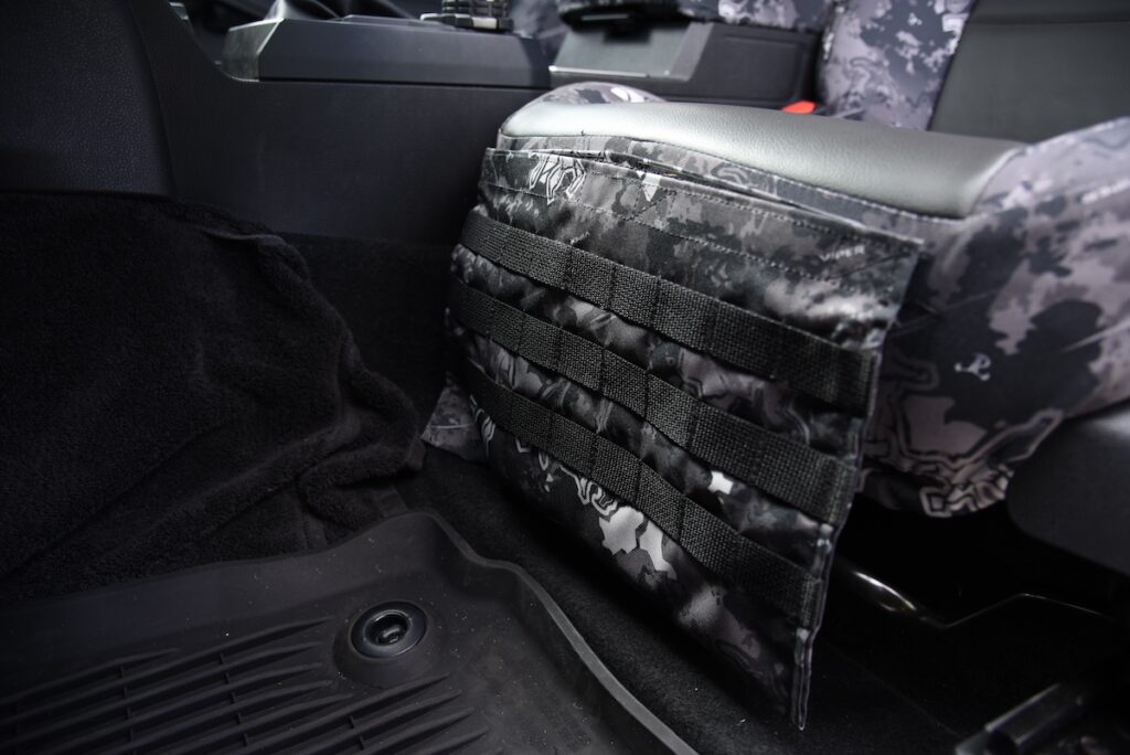 2024 Toyota Tacoma MOLLE seat back organizer with True Timber Urban camouflage and Charcoal Sof-Touch accents