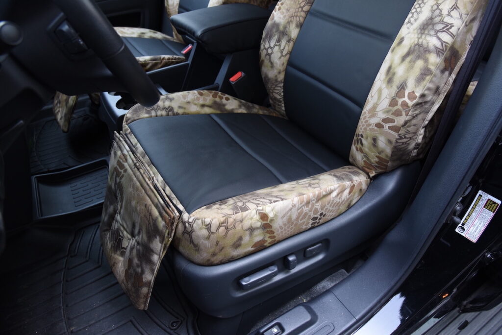 2013 Honda Ridgeline driver seat close-up with Black Sof-Touch inserts and Kryptek Highlander trim