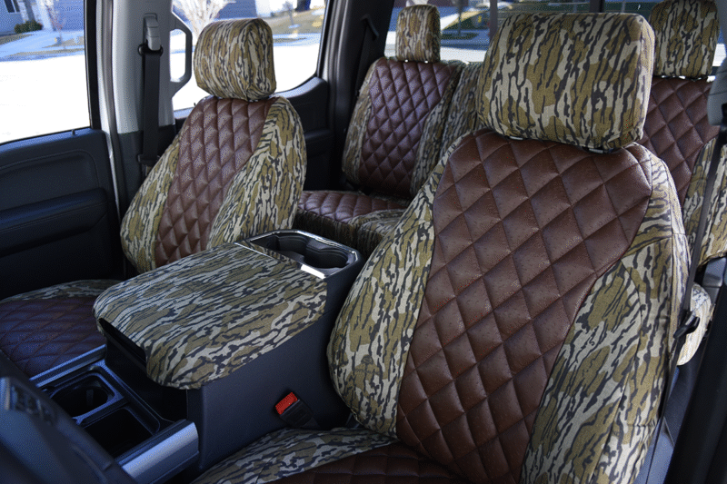 2026 Ford F-350 seat covers in Brown Ostrich Diamond Stitch leatherette and Mossy Oak Bottomland camouflage
