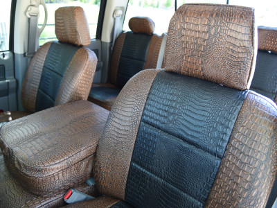 <b>
2006 RAM 3500
</b>
<br>
Insert: Midnight Croc E43 (Sim. Leather)
</br>Trim: Java Croc E42 (Sim. Leather)
</br>Product: Exotic - Gold Series Alligator Seat Cover Vid