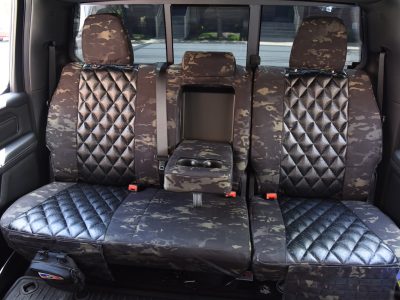 2021 RAM 1500 | Black Ostrich Diamond | MultiCam Black 2021 RAM 1500 seat covers in Black Ostrich Diamond and MultiCam Black camouflage