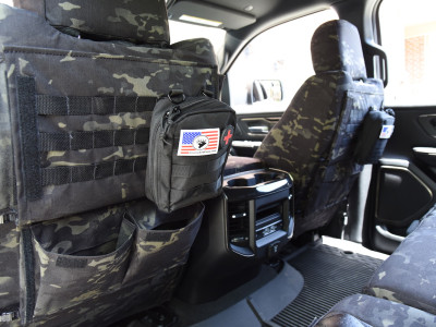 <b>2021 RAM 1500
</b><br>
Insert: Black Ostrich E01 Diamond (Sim. Leather)
</br>Trim: MultiCam Black C80 (Canvas)
<br>Product: Camo - Gold Series </br> | Covers and Camo
