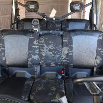 2020 Can-Am Defender | Black Ostrich | MultiCam Black 2020 Can-Am Defender rear bench UTV camo seat covers with Black Ostrich inserts and MultiCam Black trim