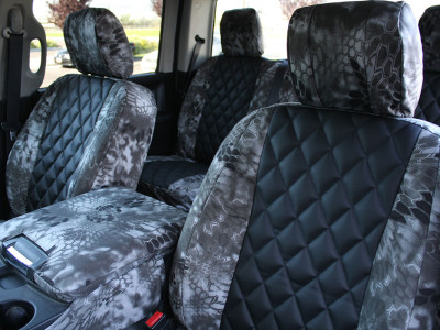 <b>
2014 Dodge Ram
</b>
<br>
Insert: Black Sof-Touch with Diamond Stitching
</br>Trim: Kryptek Raid C72 (Canvas)
<br> Product: Camo - Gold Series </br> | Covers and Camo