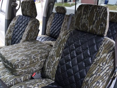2009 RAM 2500 | Midnight Croc Diamond Stitch | Mossy Oak Bottomland 2009 RAM 2500 seat covers in Midnight Croc Diamond Stitch and Mossy Oak Bottomland camouflage