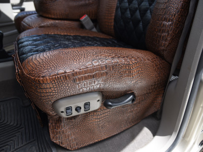 <b>
2009 RAM 2500
</b>
<br>
Insert: Midnight Croc Diamond (Sim. Leather)
</br>Trim: Java Croc E42 (Sim. Leather)
</br> Product: Exotic- Gold Series | Covers and Camo