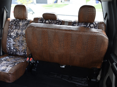 <b>
2019 Ford F-350
</b>
<br>
Insert: Goldberg Bone N Stone C74 (Canvas)
</br>Trim: Java Croc E42 (Sim. Leather)
<br> Product: Camo - Gold Series </br> 2019 Ford F-350 Rear Seat under seat view Camo seat covers Goldberg Bone N Stone insert with Java Croc trim Covers And Camo