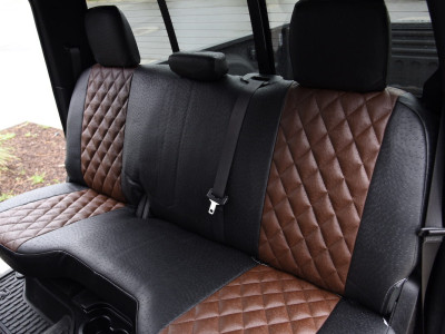 <b>
2022 RAM 2500
</b>
<br>
Insert: Brown Ostrich E04 Diamond (Sim. Leather)
</br>Trim: Black Ostrich E01 (Sim. Leather)
</br>Product: Exotic - Gold Series | Covers and Camo