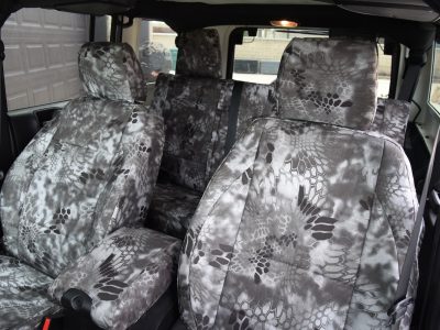 2015 Jeep Wrangler | Kryptek Raid 2015 Jeep Wrangler front Kryptek Raid seat covers with matching console cover