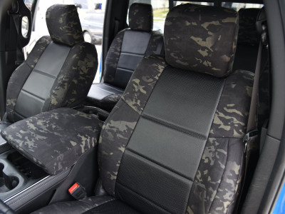 <b>
2023 RAM 2500
</b>
<br>
Insert: Black Perforatred Sof-Touch L01 (Sim. Leather)
</br>Trim: MultiCam Black C80 (Canvas)
</br>Product: Camo - Gold Series | Covers and Camo