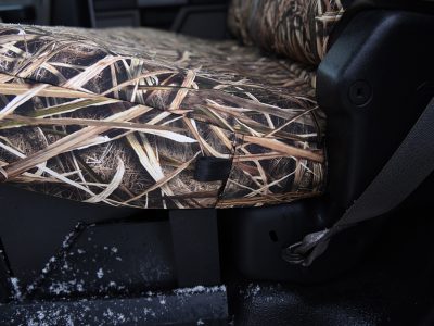 Seat bottom close-up of 2019 Ford F-550 seat covers in Mossy Oak Shadow Grass Blades camouflage
