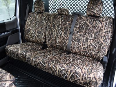 Rear seat view of 2019 Ford F-550 seat covers in Mossy Oak Shadow Grass Blades camouflage