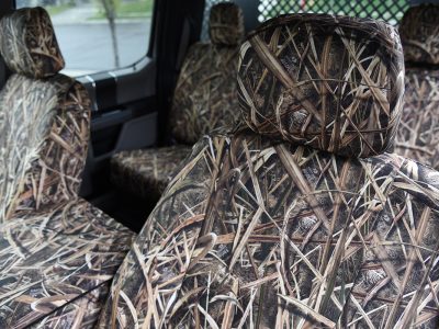 Front seat close-up of 2019 Ford F-550 seat covers in Mossy Oak Shadow Grass Blades camouflage