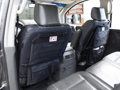 2006 Nissan Titan | Charcoal Sof-Touch Diamond | Black Sof-Touch 2006 Nissan Titan front leatherette seat backs with Black Sof-Touch trim, MOLLE panels and storage pockets