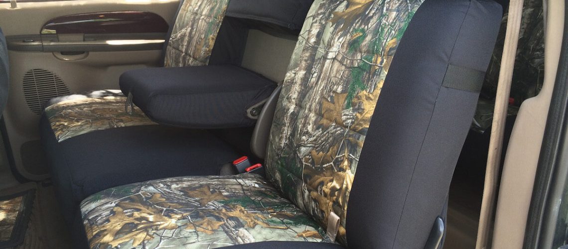 2004 Ford Excursion second-row Realtree Xtra camo seat covers with Black Dura EZ-Care trim