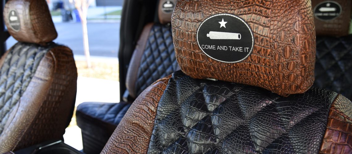 2018 Ford F-350 headrest cover in Midnight Croc simulated leather with embroidered patch